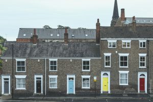 Row of UK residential houses typical of buy-to-let rental properties affected by the 2027 property tax changes