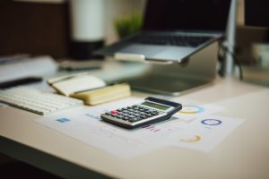 Calculator on a desk, used to compare sole trader and limited company tax